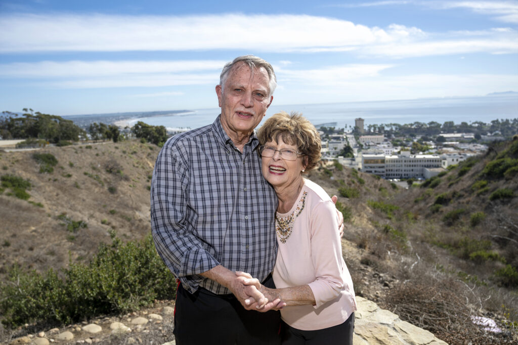 Mike and Loretta Merewether smiling at the Ventura Botanical Gardens